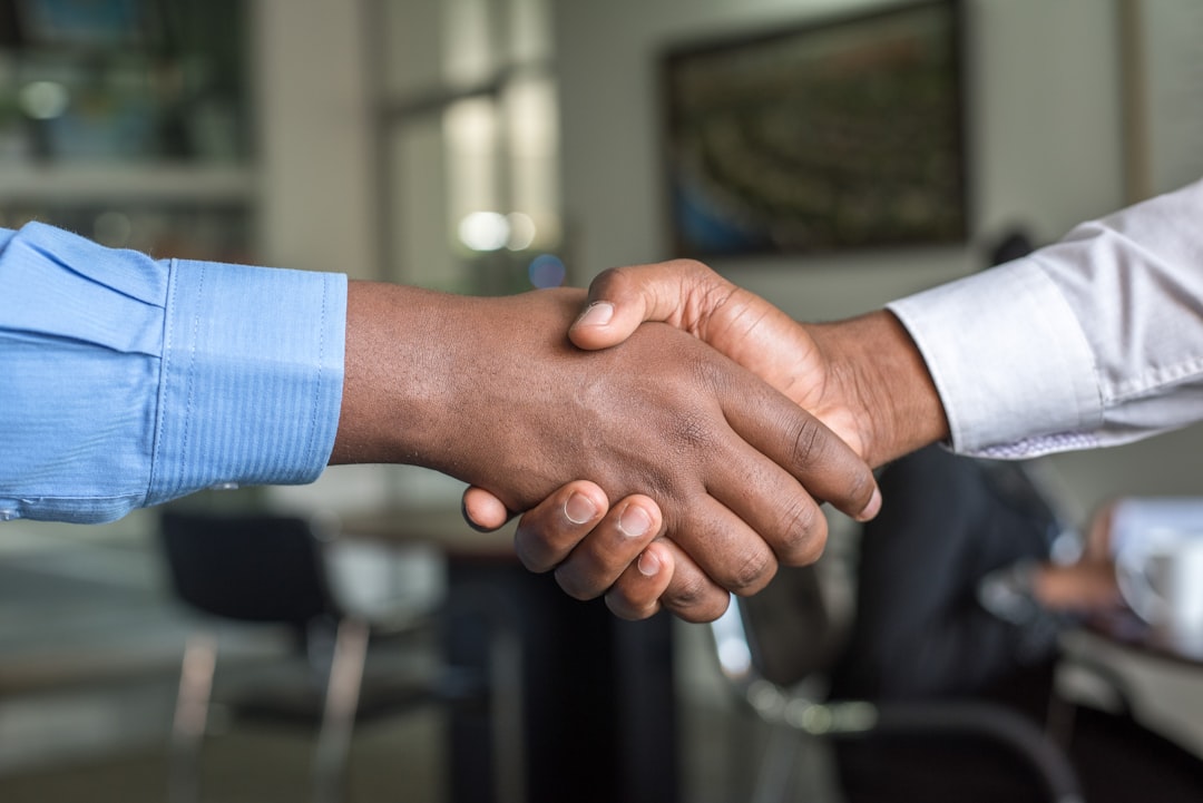 A diverse group of professionals collaborating in a modern office setting, representing the various industries in Florida that need PLI. - what does professional liability insurance cover