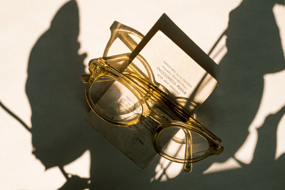 Magnifying glass over an insurance policy document, symbolizing the details of D&O coverage.